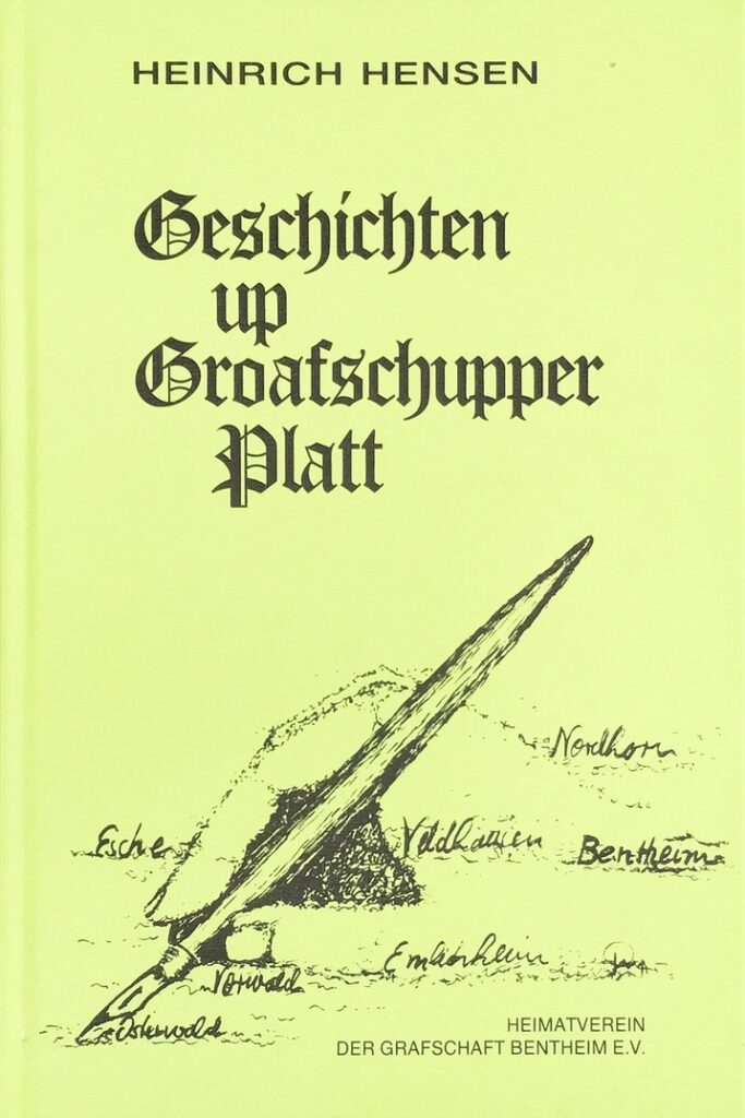 Buchcover in Gelbgrün mit dem Titel „Geschichten up Groafschupper Platt von Heinrich Hensen in Frakturschrift, darunter eine Zeichnung einer Schreibfeder auf einer Landkarte mit handgeschriebenen Ortsnamen wie Nordhorn, Bentheim, Veldhausen, Esche und Emlichheim, herausgegeben vom Heimatverein der Grafschaft Bentheim e.V.